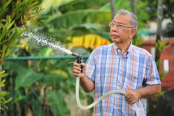 Hussien watering plants