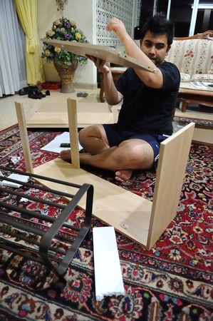 Haniff making a shoe rack