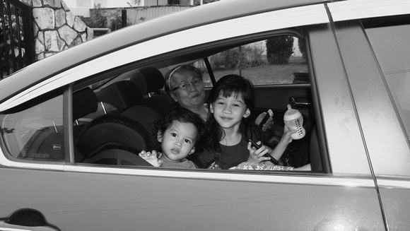 Qamelia and Eryna in Haniff's car